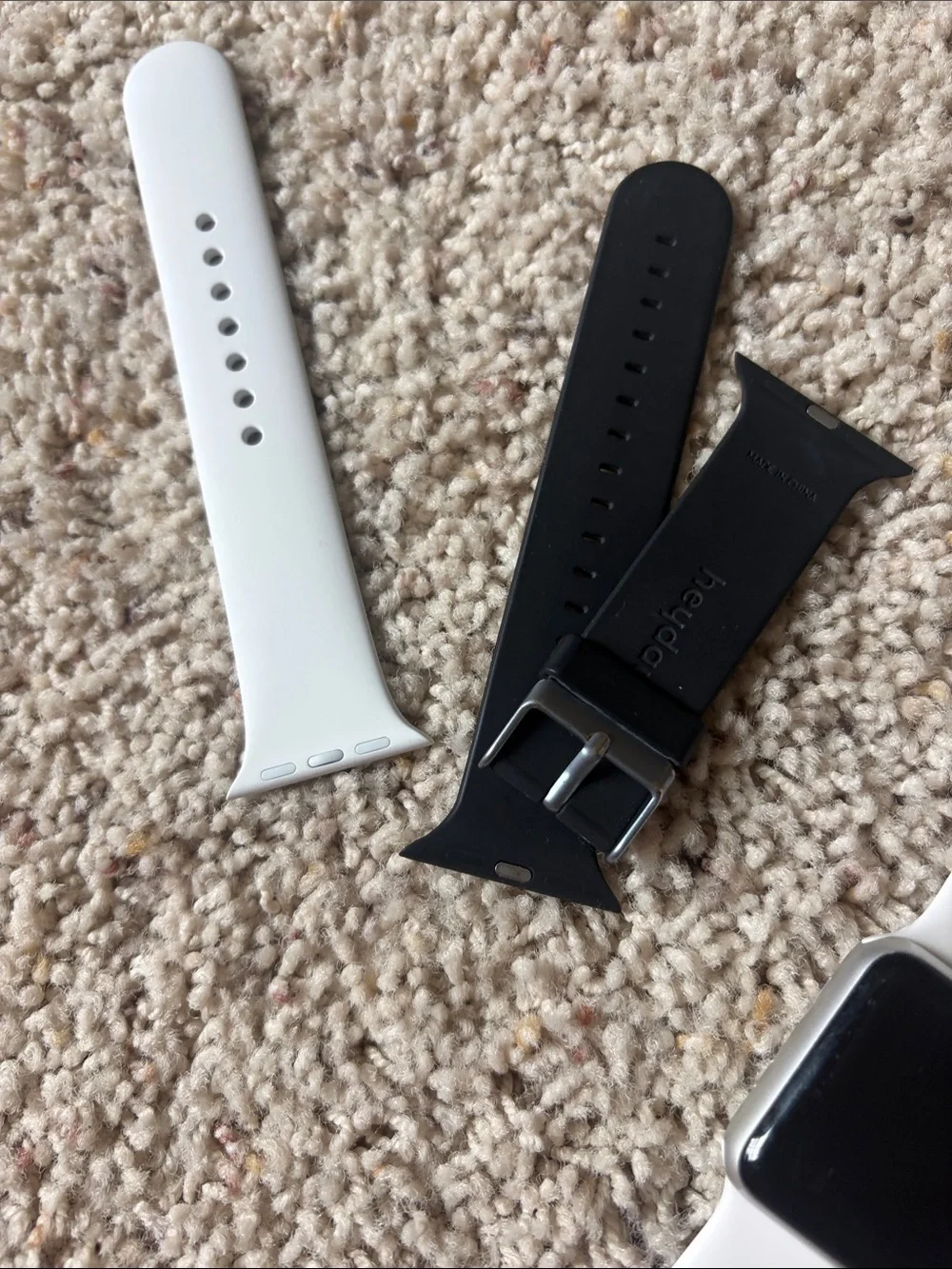 White Apple Watch Series 3 with Extra Bands and Magnetic Charger